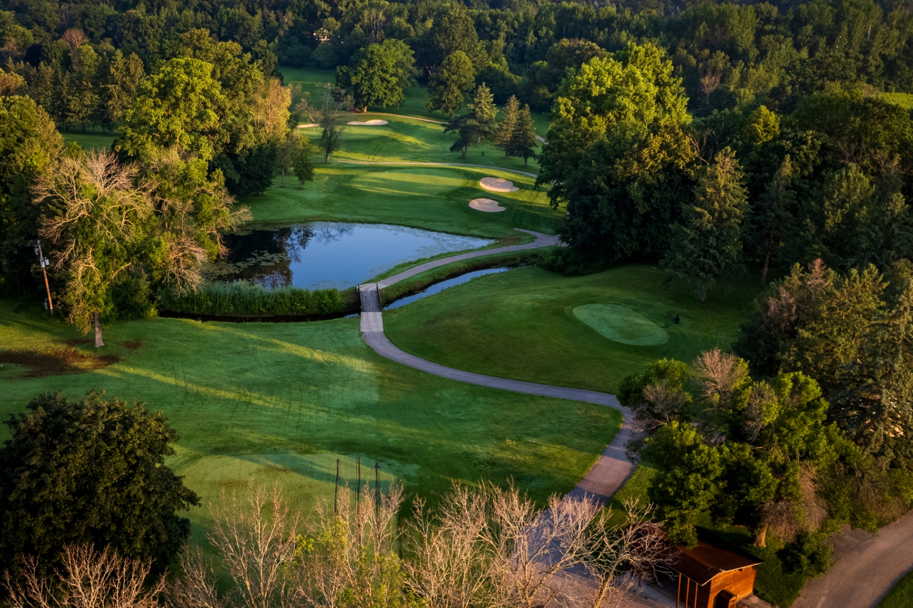 Aerial view of Brown County Golf Course with pond and bridge